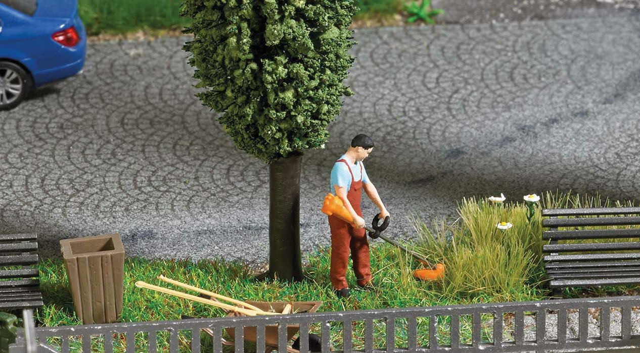 Busch 7853 Lawn Trimmer/ Whipper Snipper with Gardener, Trees, and Park Benches - HO Scale